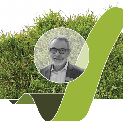 A portrait of Bernard Goffinet, from the University Connecticut, overa background of mosses.